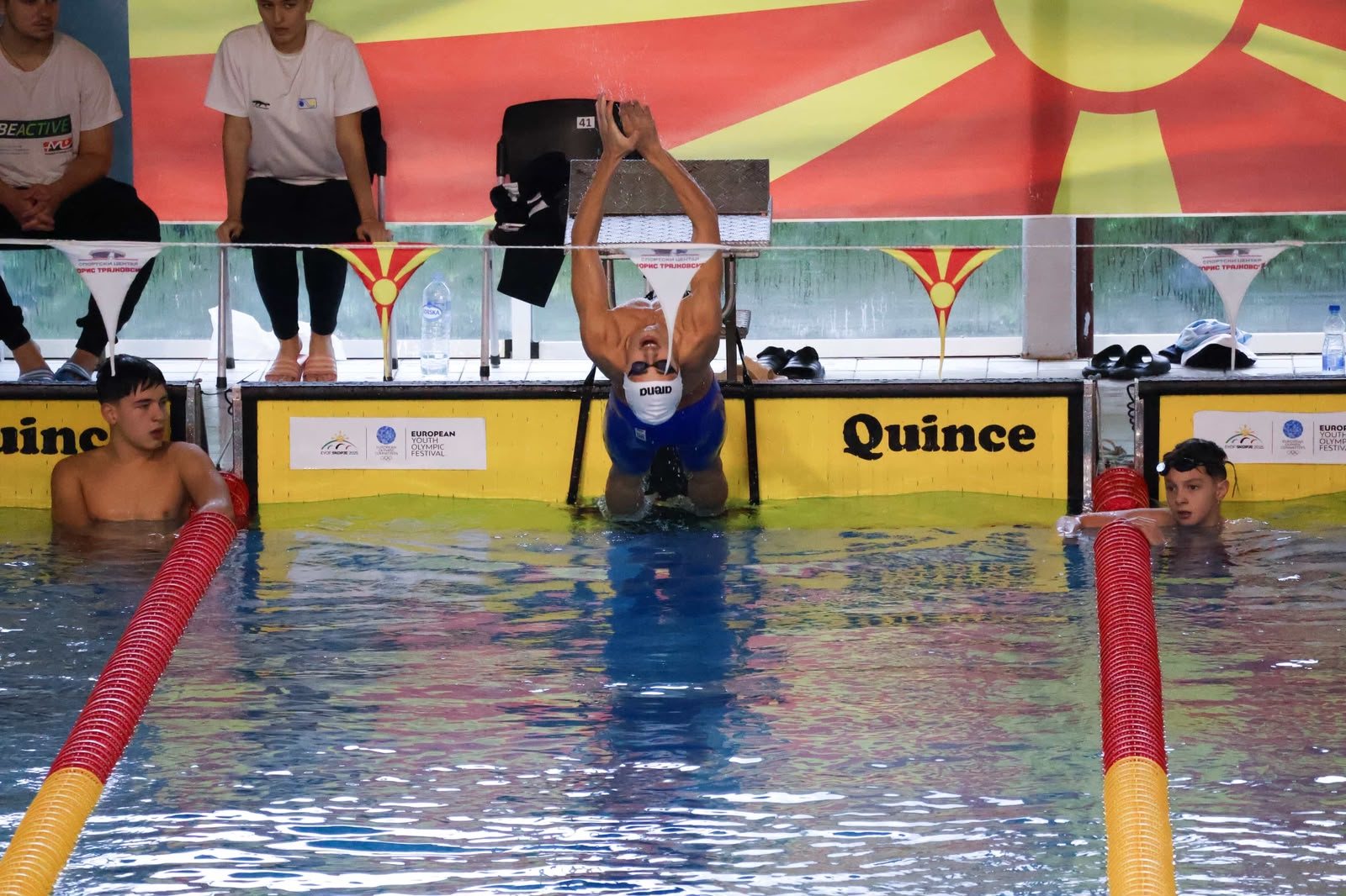Klint Hoxha at the wall during backstroke competition