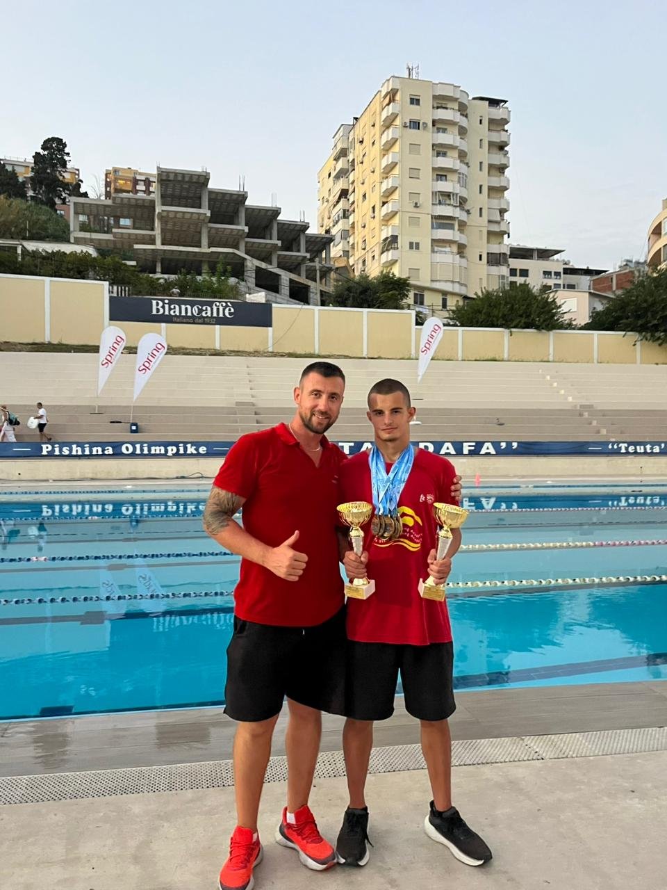 Klint Hoxha with coach Eduard Cane after being named Best Junior and Best Senior Male Athlete at the National Championship, Durrës 2026