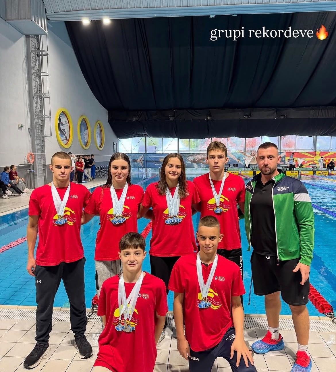 Te Stela Swimming Academy teammates with medals